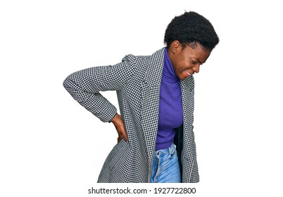 Young African American Girl Wearing Casual Clothes Suffering Of Backache, Touching Back With Hand, Muscular Pain 