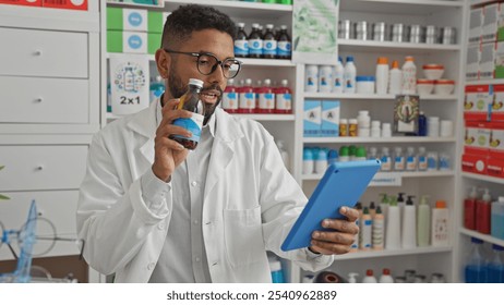 Young african american male pharmacist examining medication while holding a tablet in a drugstore - Powered by Shutterstock