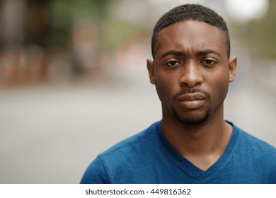 Young African American Man In City Serious Face Portrait
