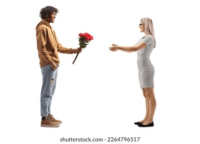 Young african american man giving red roses to a surprised caucasian woman isolated on white background - Powered by Shutterstock