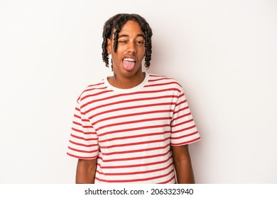 Young African American Man Isolated On White Background Funny And Friendly Sticking Out Tongue.