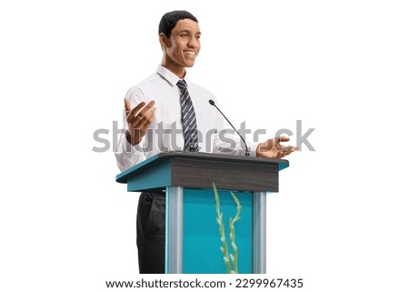 Young african american man on a pedestal giving a speech isolated on white background
