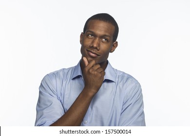 Young African American man thinking, horizontal