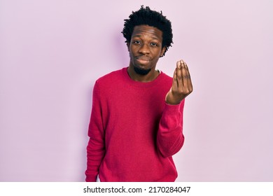 Young African American Man Wearing Casual Clothes Doing Italian Gesture With Hand And Fingers Confident Expression 