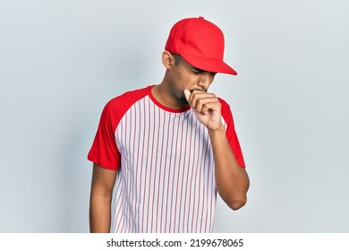 Young African American Man Wearing Baseball Uniform Relax And Smiling With Eyes Closed Doing Meditation Gesture With Fingers. Yoga Concept. 