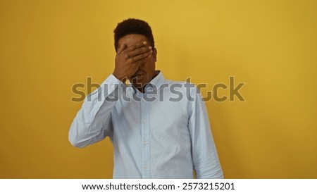 Similar – Image, Stock Photo Thoughtful young bold African American female model in trendy outfit and sunglasses looking away on pink background