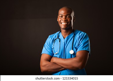 Young African American Medical Doctor Portrait Over Black Background