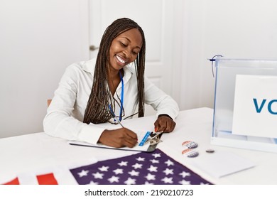 Young African American Politic Party Worker Working At Electoral College.