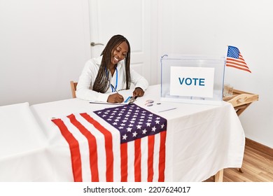 Young African American Politic Party Worker Working At Electoral College.