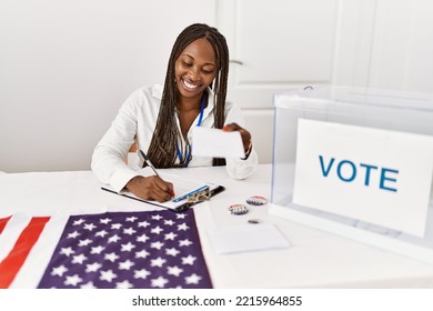 Young African American Politic Party Worker Holding Vote At Electoral College.