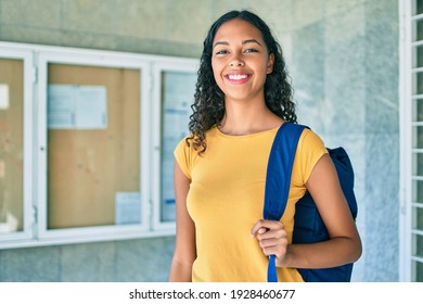 Young African American Student Girl Smiling Happy Walking At University Campus.