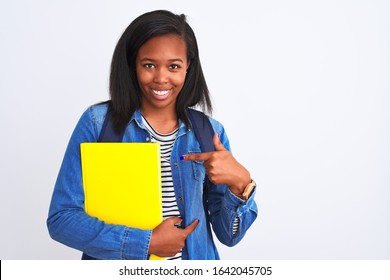 Young African American Student Woman Wearing Backpack And Book Over Isolated Background Very Happy Pointing With Hand And Finger