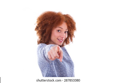 Young african american teenage girl pointing finger to the screen, isolated on white background - black people