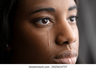 Young African American woman crying - Powered by Shutterstock