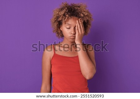 Similar – Image, Stock Photo Thoughtful young bold African American female model in trendy outfit and sunglasses looking away on pink background