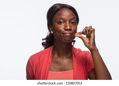 Young African American Woman Keeping Quiet, Horizontal