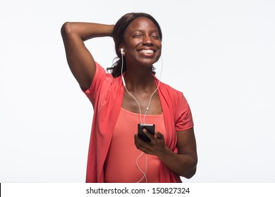 Young African American woman on iPod, horizontal