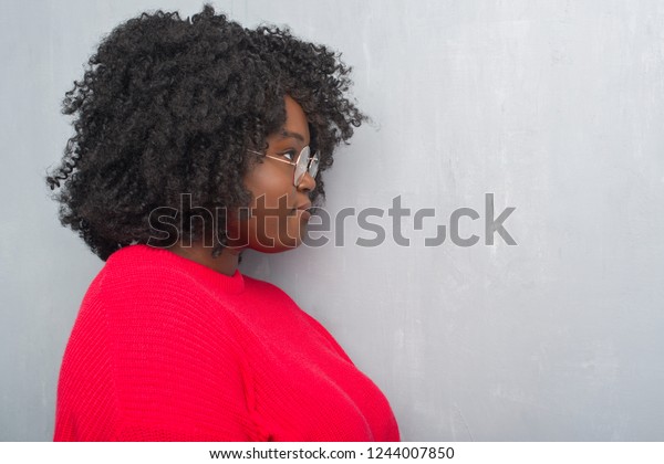 Young African American Woman Over Grey Stock Photo Edit Now