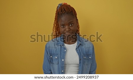 Similar – Image, Stock Photo Thoughtful young bold African American female model in trendy outfit and sunglasses looking away on pink background