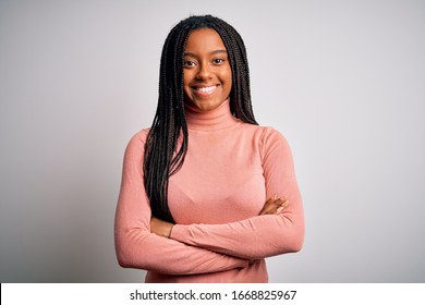 Young African American Woman Standing Casual And Cool Over White Isolated Background Happy Face Smiling With Crossed Arms Looking At The Camera. Positive Person.