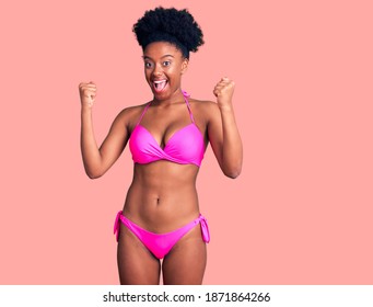 Young African American Woman Wearing Bikini Screaming Proud, Celebrating Victory And Success Very Excited With Raised Arms 