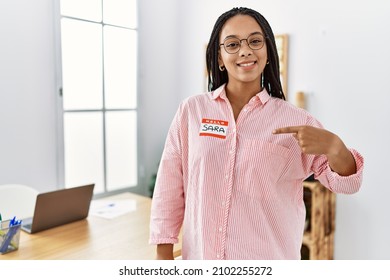 Young African American Woman Wearing Hello My Name Is Sticker Identification Smiling Happy Pointing With Hand And Finger 