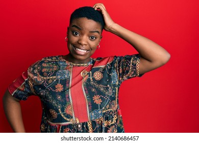 Young african american woman wearing african style confuse and wonder about question. uncertain with doubt, thinking with hand on head. pensive concept.  - Shutterstock ID 2140686457
