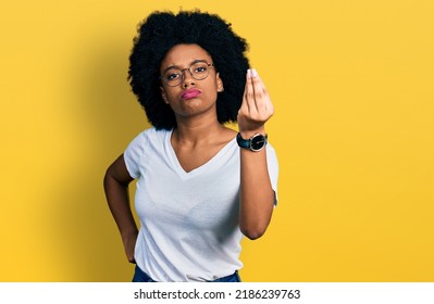 Young African American Woman Wearing Casual White T Shirt Doing Italian Gesture With Hand And Fingers Confident Expression 