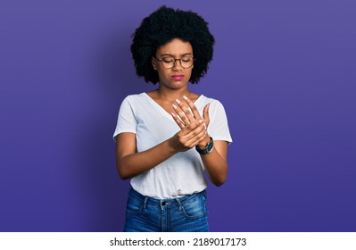 Young African American Woman Wearing Casual White T Shirt Suffering Pain On Hands And Fingers, Arthritis Inflammation 