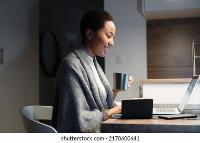 Young African American Woman Working Late At Night, From Her Home