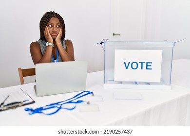 Young African American Woman Working At Political Election Sitting By Ballot Tired Hands Covering Face, Depression And Sadness, Upset And Irritated For Problem 