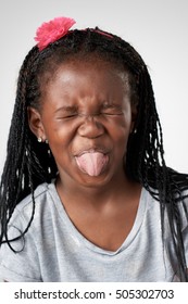 Young African Black Child Making Funny  Silly Face