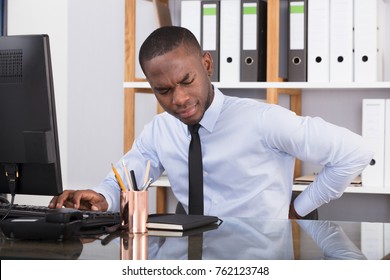 African American Businessman Sitting On Desk Images, Stock Photos ...