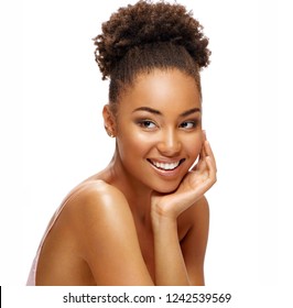 Young african girl with perfect skin on white background. Beauty & Skin care concept
