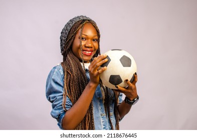 young african Joyful positive lady supporting football team, sport betting, active life, age concept