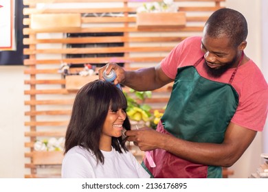 Young African Lady In A Hair Salon To Get Her Hair Done