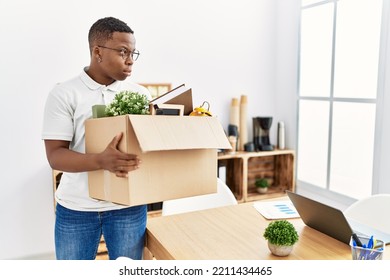 Young African Man Fired Holding Box With Personal Items At Business Office