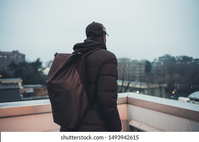 Young African Man Outdoors Posing Parking Lot Looking Away - Rebel, Rude Boy, Swag Concept