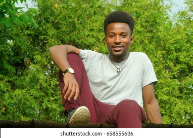 Young African Man Sitting Nature Foliage Stock Photo 658555636 ...