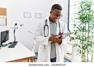 Young African Man Working As Doctor At Medical Clinic