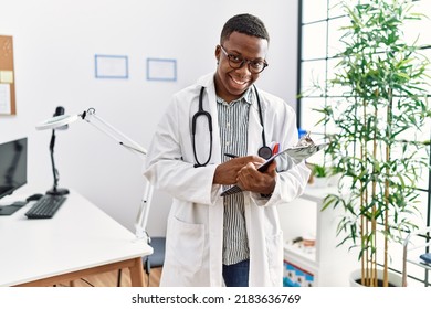 Young African Man Working As Doctor At Medical Clinic