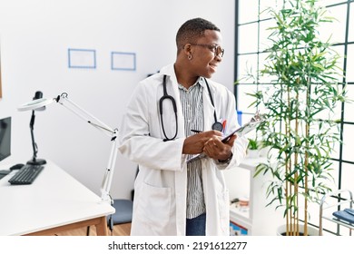 Young African Man Working As Doctor At Medical Clinic