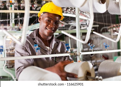 Young African Textile Industry Worker In Factory