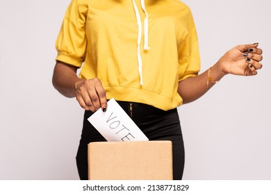 Young African Woman Casting Her Vote