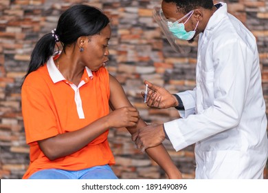 Young African Woman Getting Vaccinated