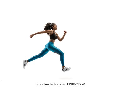 Young African Woman Running Isolated On White Studio Background. One Female Runner Or Jogger. Silhouette Of Jogging Athlete