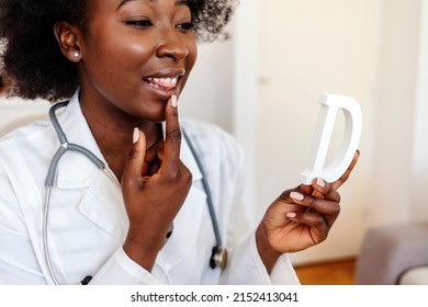 Young African-Amercian Female Speech Teacher Hold Speech Therapy Session With Students Online, Teaches Pronunciation And Language Difficulties, Using Laptop. Speech Therapist Conducts An Online Lesson