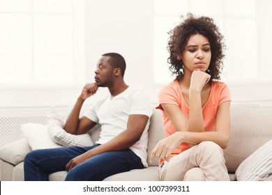 Young african-american couple quarreling at home, woman offended. Family relationship difficulties concept - Shutterstock ID 1007399311