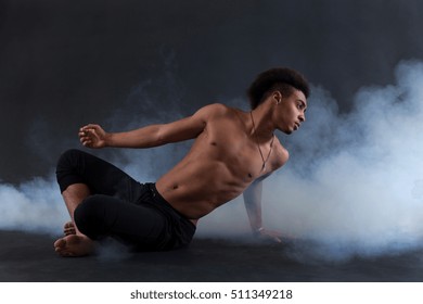 Young African-american Man Performing An Artistic Contemporary Dance.