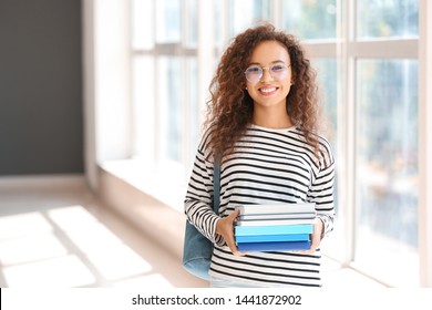 Young African-American student in university - Shutterstock ID 1441872902